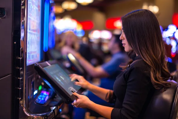VM916 Jackpot Slots — Spin for massive rewards A dramatic shot of winning sevens landing on a slot reel surrounded by shining gold coins, symbolizing big wins.
